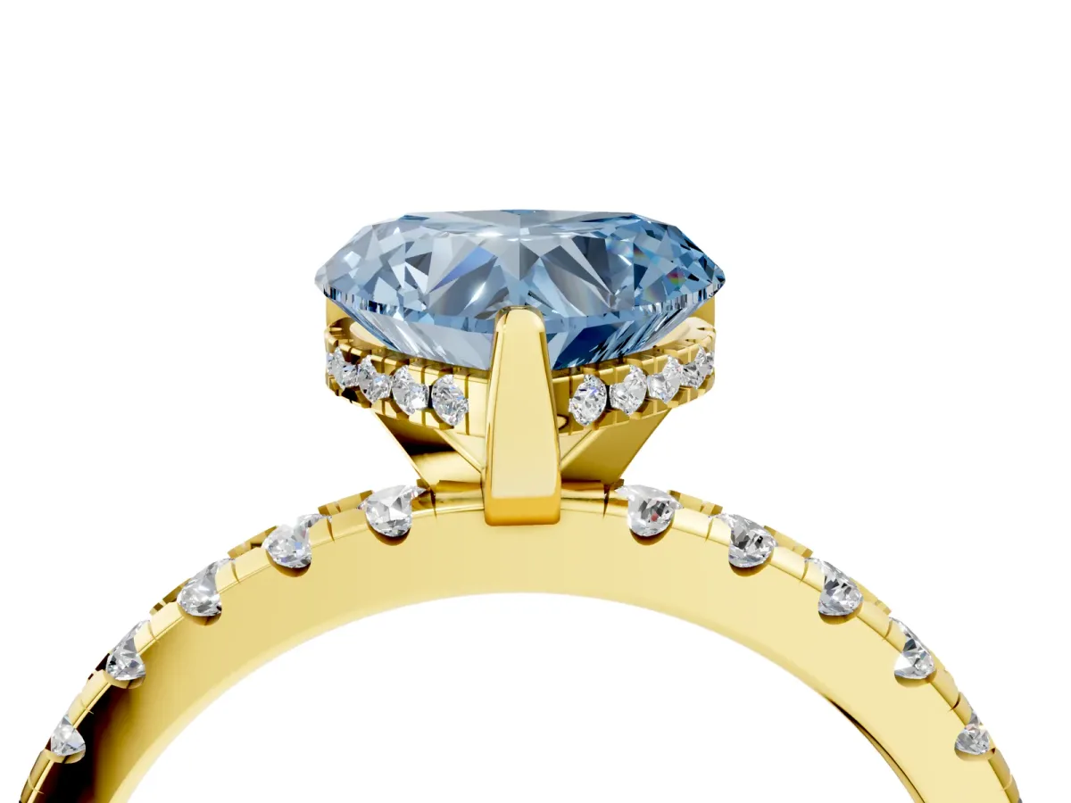 Fancy Blue Heart Cut Diamond Solitaire Ring with Round Pavé Band and Four-Prong Setting Yellow gold