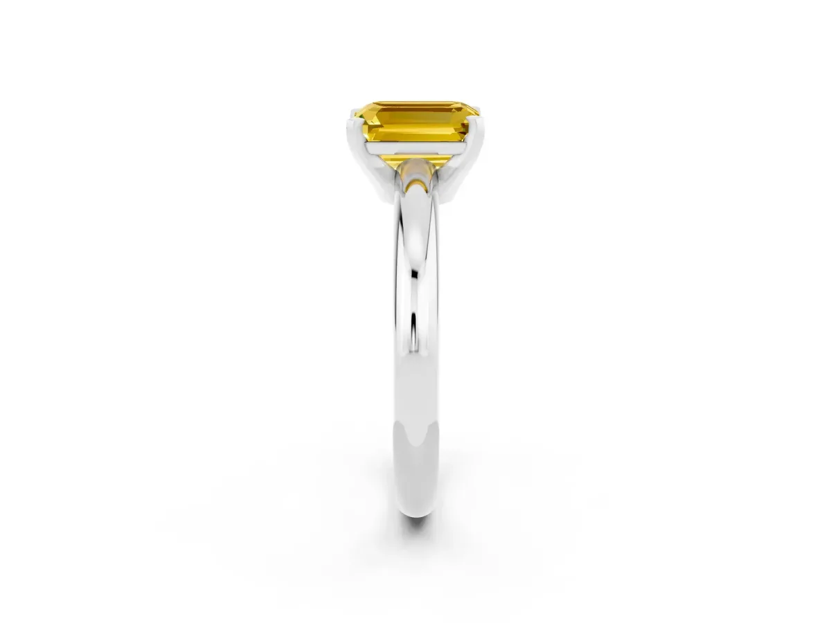 Emerald Cut Yellow Sapphire Solitaire Engagement Ring with Round Band and Four-Prong Setting Silver