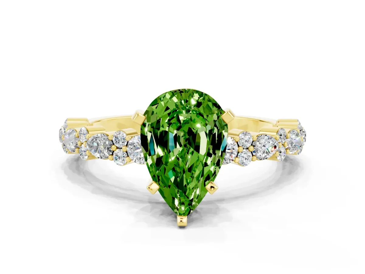 Pear Cut Peridot Side Stone Solitaire Ring with Round and Four-Prong Setting Yellow gold