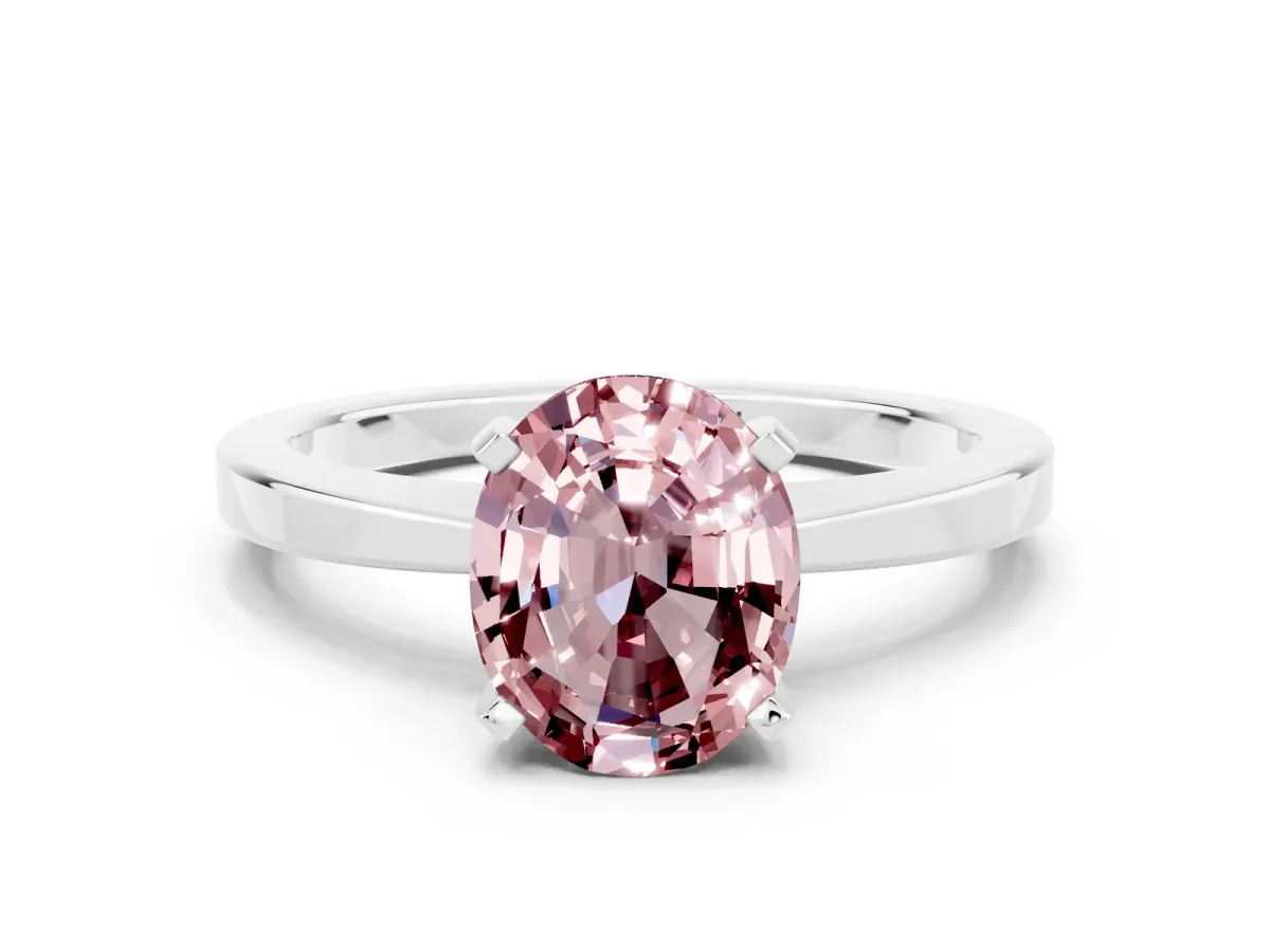 Oval Cut Morganite Solitaire Engagement Ring with Classic Band and Four-Prong Setting Platinum