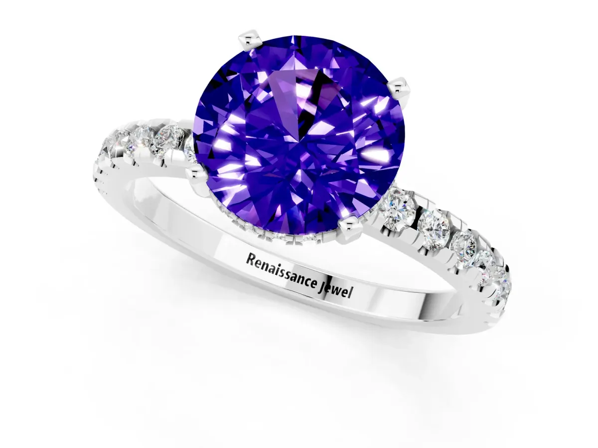 Round Cut Tanzanite Solitaire Ring with Round Pavé Band and Four-Prong Setting Silver