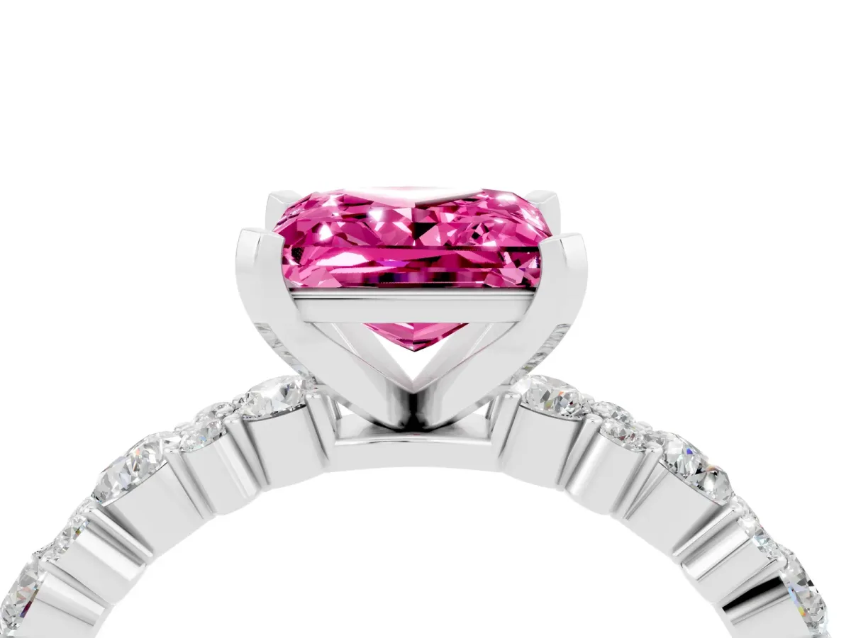 Princess Cut Pink Sapphire Side Stone Solitaire Ring with Round and Four-Prong Setting Platinum