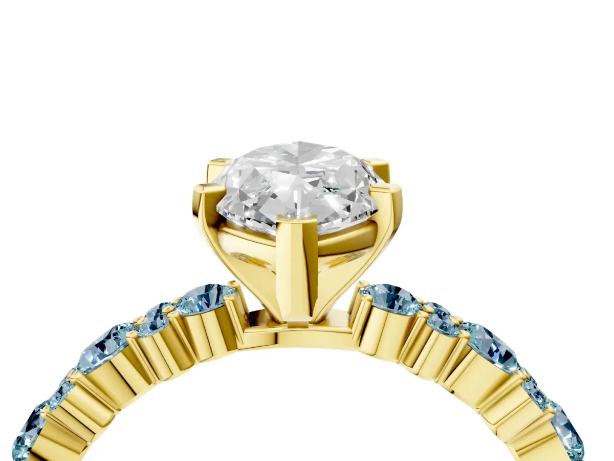 Marquise Cut Diamond Side Stone Solitaire Ring with Round Aquamarine and Four-Prong Setting Yellow gold