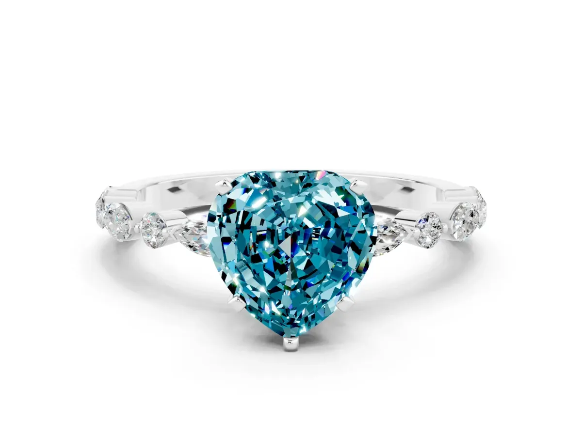 Heart Cut Blue Topaz Ring with Marquise and Round Side Stones and Four-Prong Setting Silver