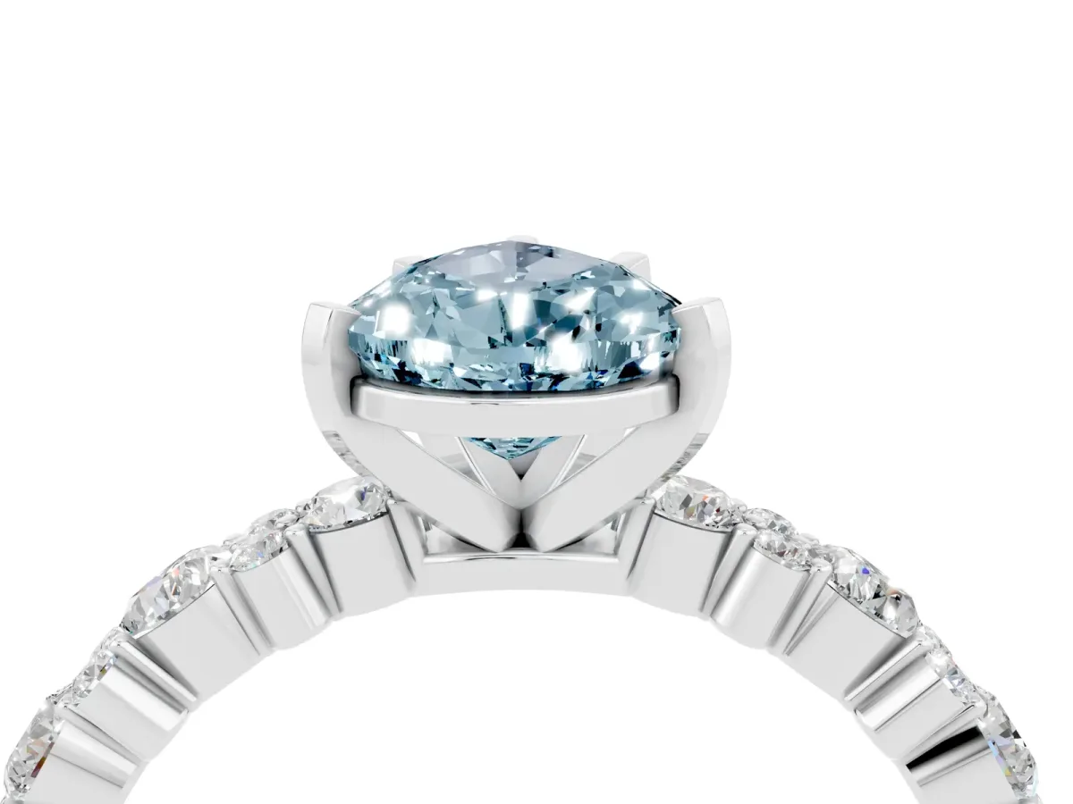 Pear Cut Aquamarine Side Stone Solitaire Ring with Round and Four-Prong Setting White gold