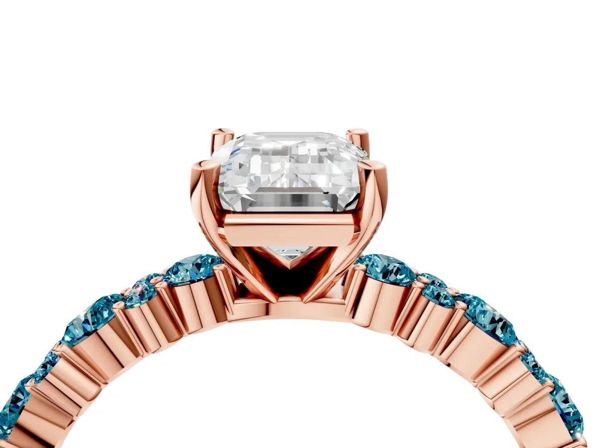 Emerald Cut Diamond Side Stone Solitaire Ring with Round Blue Topaz and Four-Prong Setting Rose gold