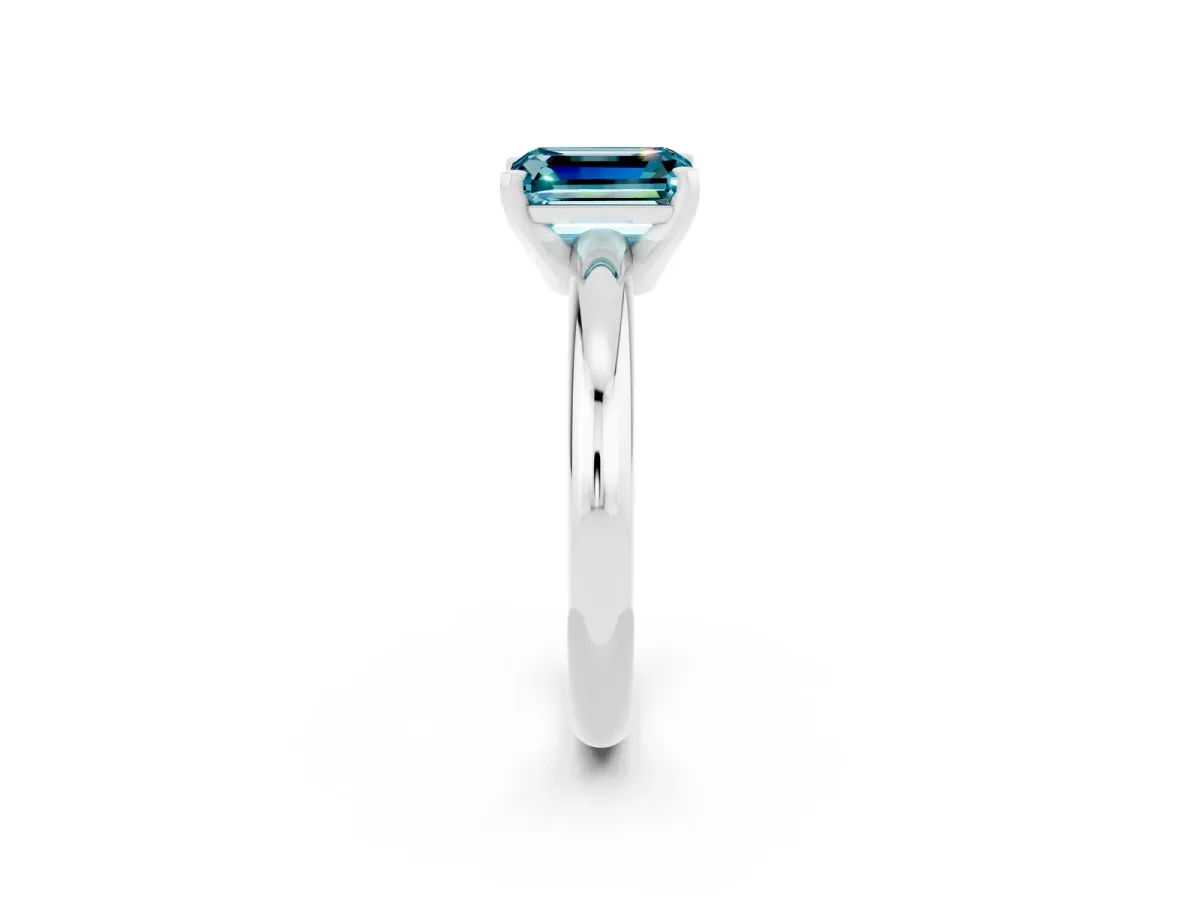 Emerald Cut Blue Topaz Solitaire Engagement Ring with Round Band and Four-Prong Setting Silver