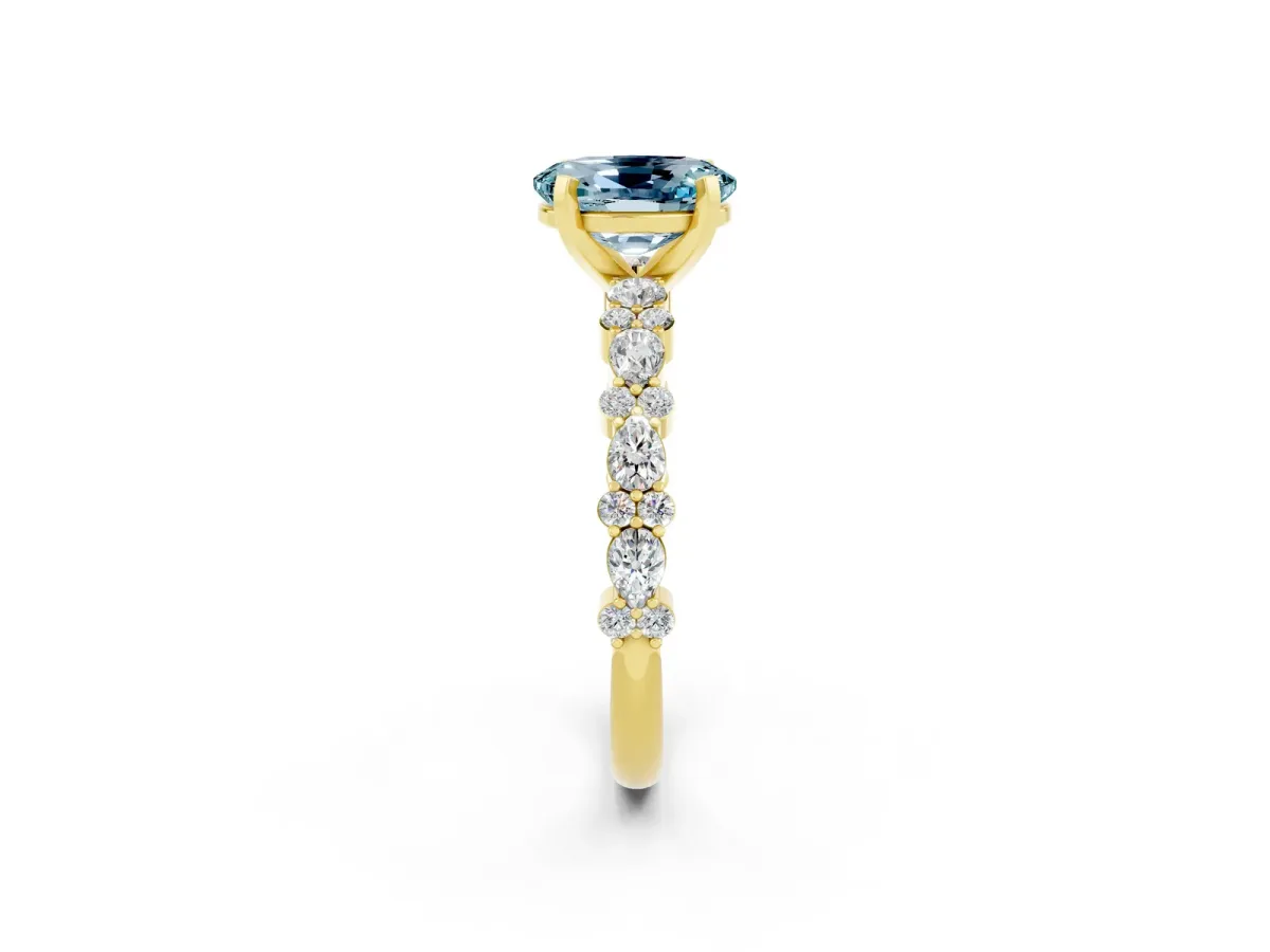 Oval Cut Aquamarine Side Stone Solitaire Ring with Round and Four-Prong Setting Yellow gold