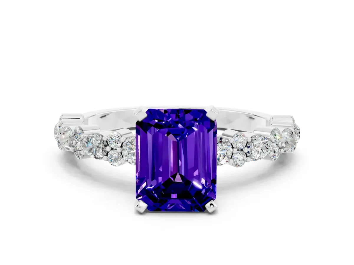 Emerald Cut Tanzanite Side Stone Solitaire Ring with Round and Four-Prong Setting Platinum