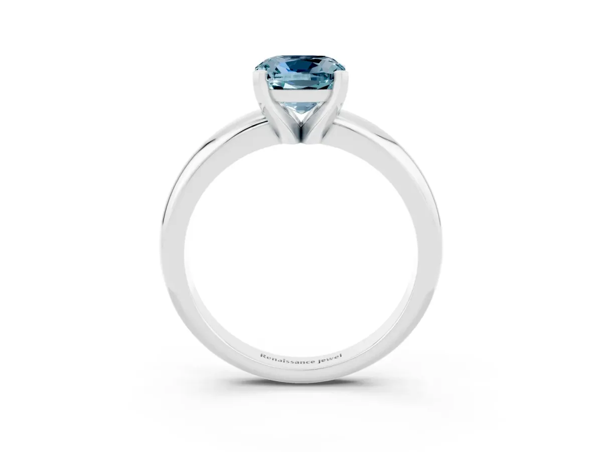 Cushion Cut Aquamarine Solitaire Engagement Ring with Round Band and Four-Prong Setting Silver