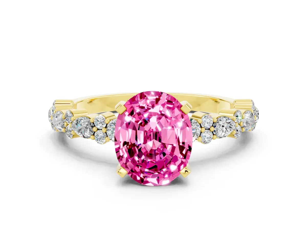 Oval Cut Pink Sapphire Side Stone Solitaire Ring with Round and Four-Prong Setting Yellow gold