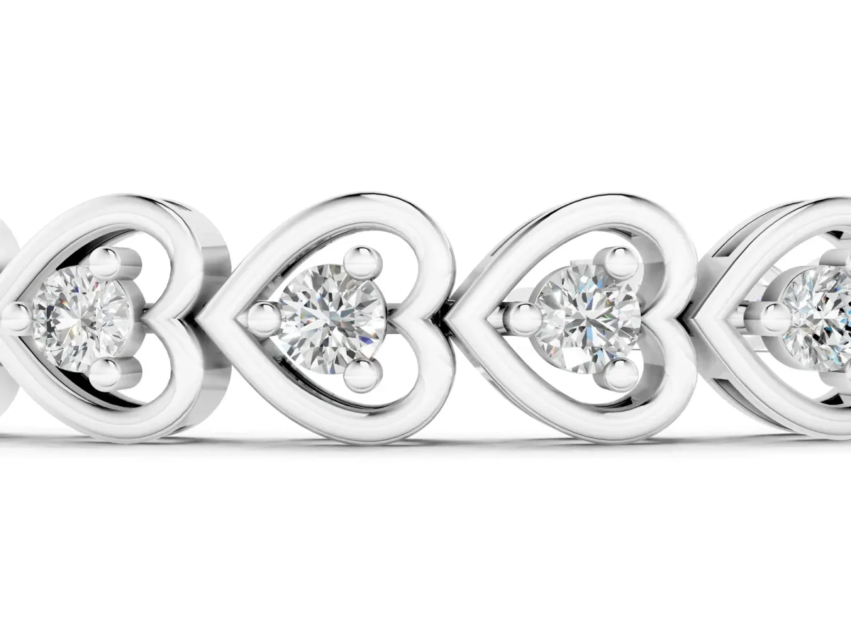 Heart-Shaped Diamond Tennis Bracelet with Channel Setting and Prong Set Stones Silver