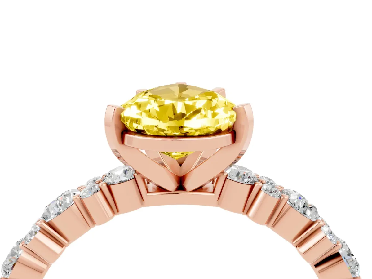 Pear Cut Yellow Sapphire Side Stone Solitaire Ring with Round and Four-Prong Setting Rose gold