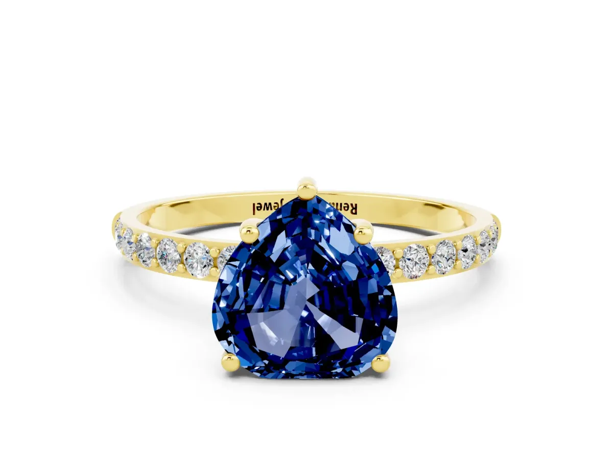 Heart Cut Blue Sapphire Solitaire Ring with Round Pavé Band and Prong Setting Yellow gold
