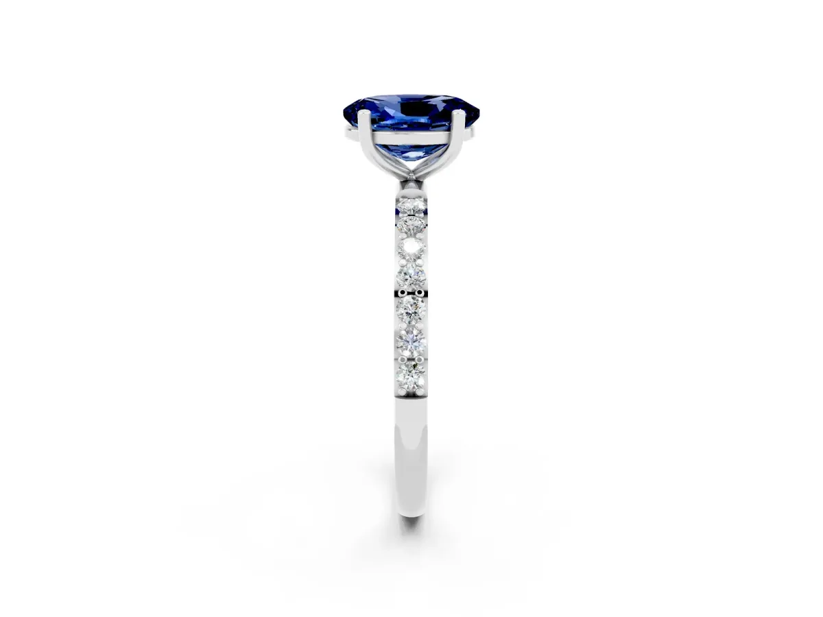 Oval Cut Blue Sapphire Solitaire Ring with Round Pavé Band and Prong Setting Silver