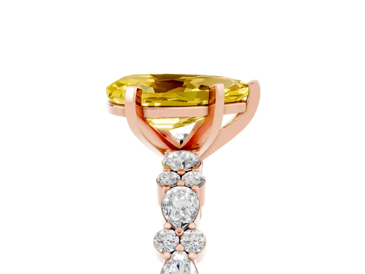 Pear Cut Yellow Sapphire Side Stone Solitaire Ring with Round and Four-Prong Setting Rose gold