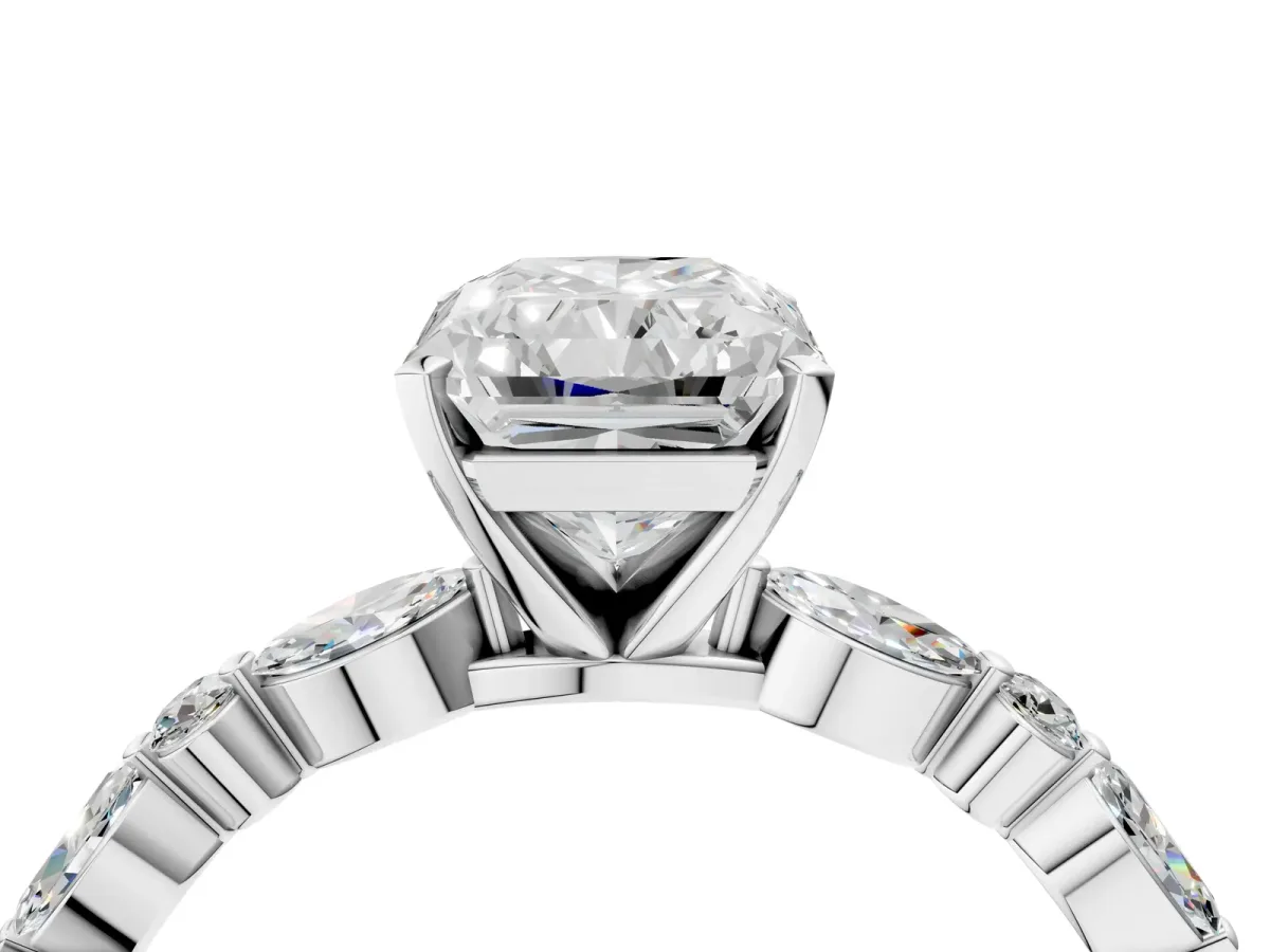 Radiant Cut Diamond Ring with Marquise and Round Side Stones and Four-Prong Setting Platinum