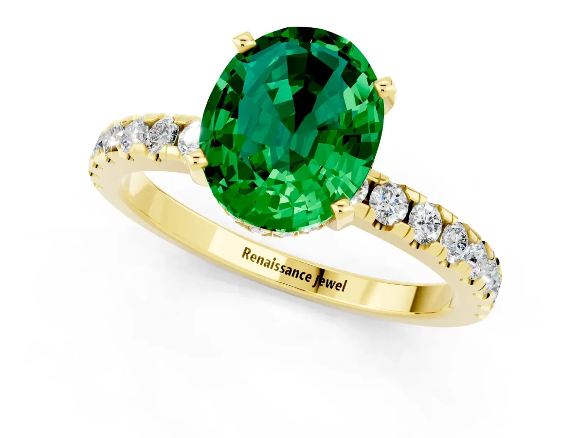 Oval Cut Emerald Solitaire Ring with Round Pavé Band and Four-Prong Setting Yellow gold
