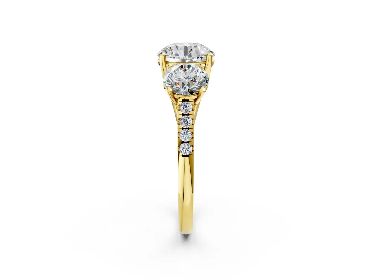 Three-Stone Round Cut Diamond Ring with Round Pavé Band and Prong Setting Yellow gold