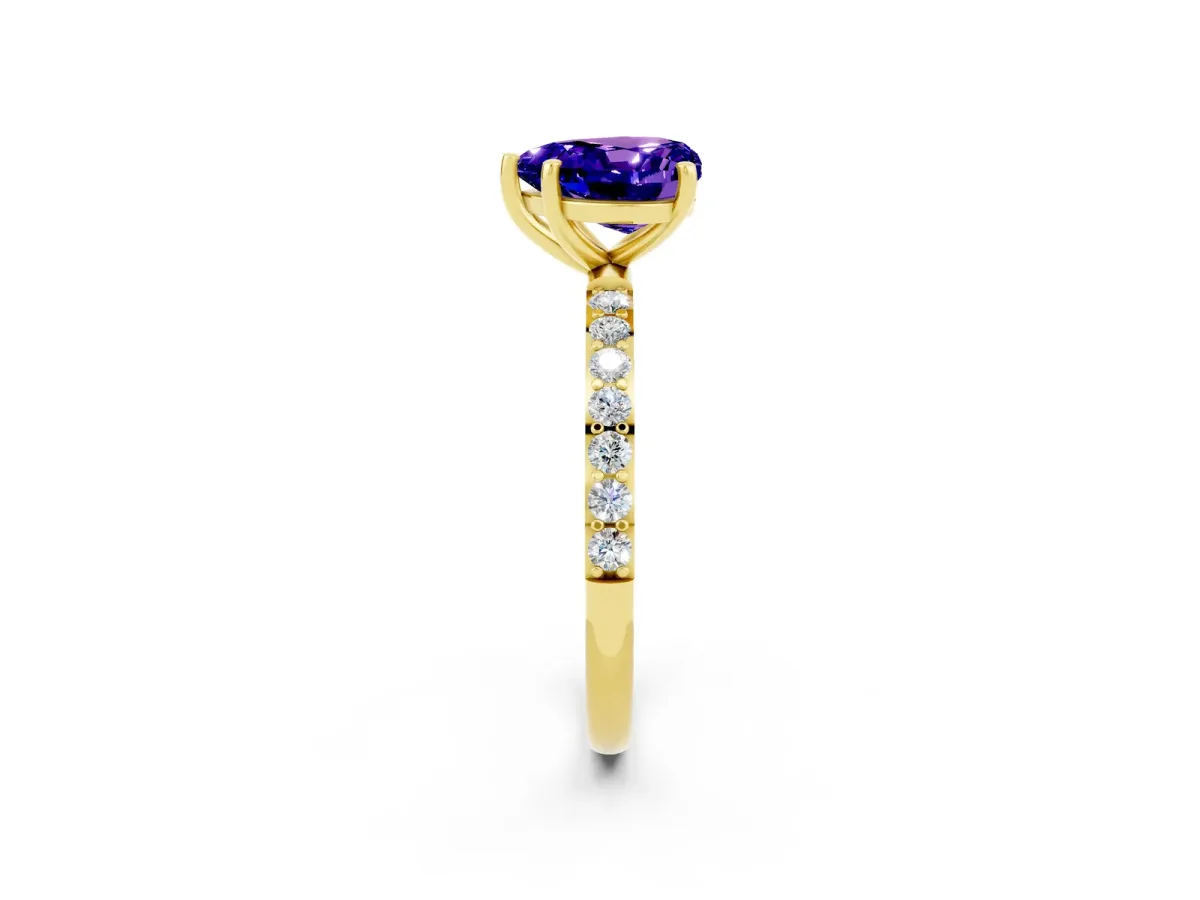 Heart Cut Tanzanite Solitaire Ring with Round Pavé Band and Prong Setting Yellow gold