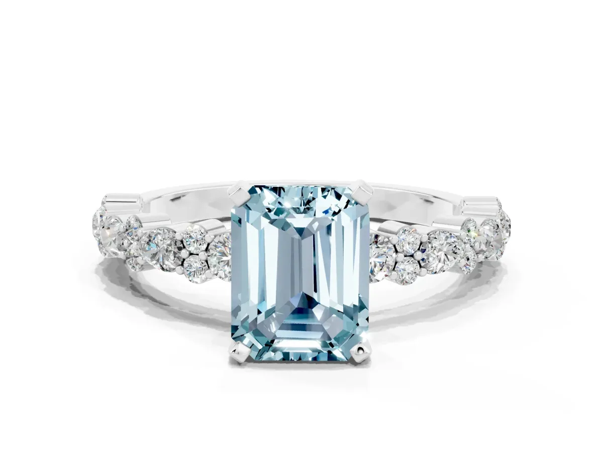 Emerald Cut Aquamarine Side Stone Solitaire Ring with Round and Four-Prong Setting White gold