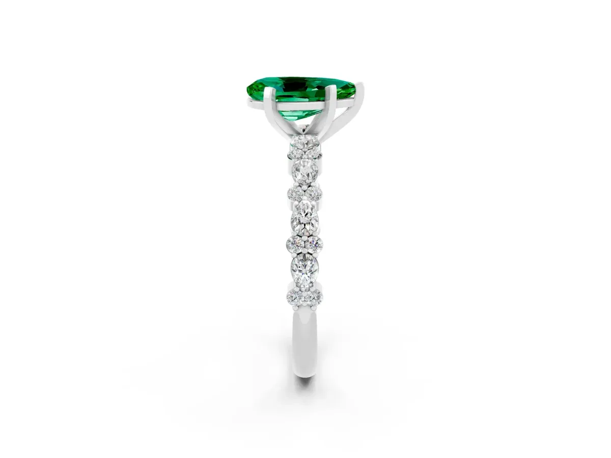 Pear Cut Emerald Side Stone Solitaire Ring with Round and Four-Prong Setting White gold