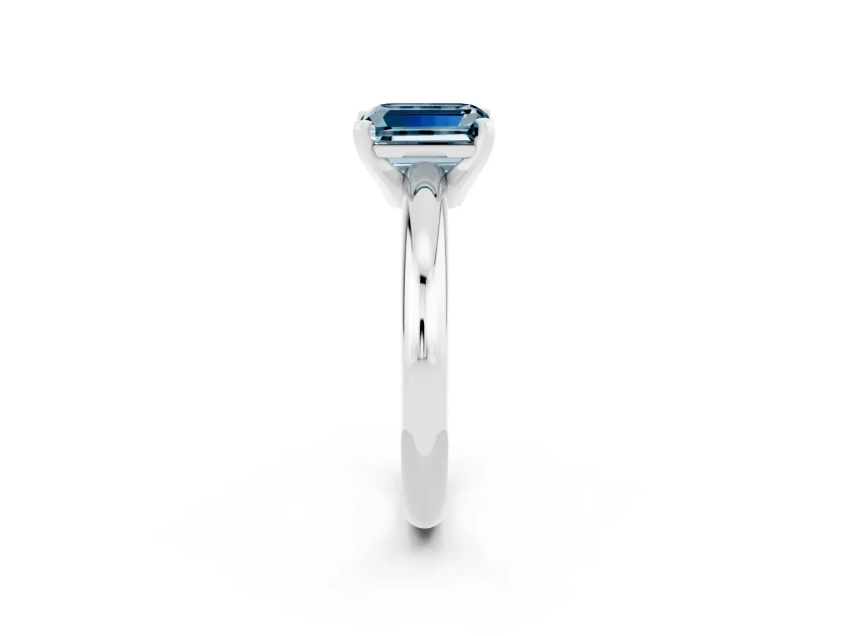 Emerald Cut Aquamarine Solitaire Engagement Ring with Round Band and Four-Prong Setting Platinum