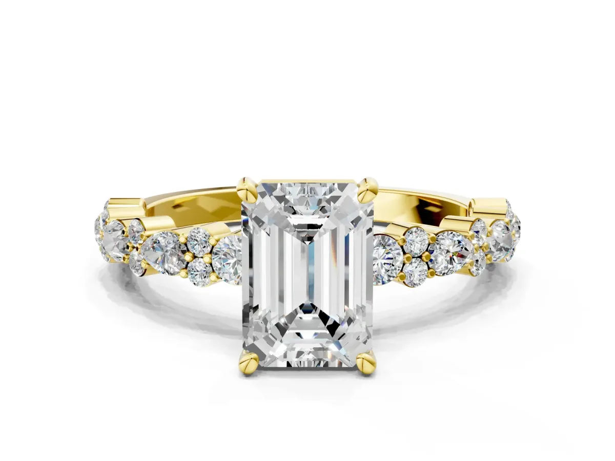 Emerald Cut Diamond Side Stone Solitaire Ring with Round and Four-Prong Setting Yellow gold