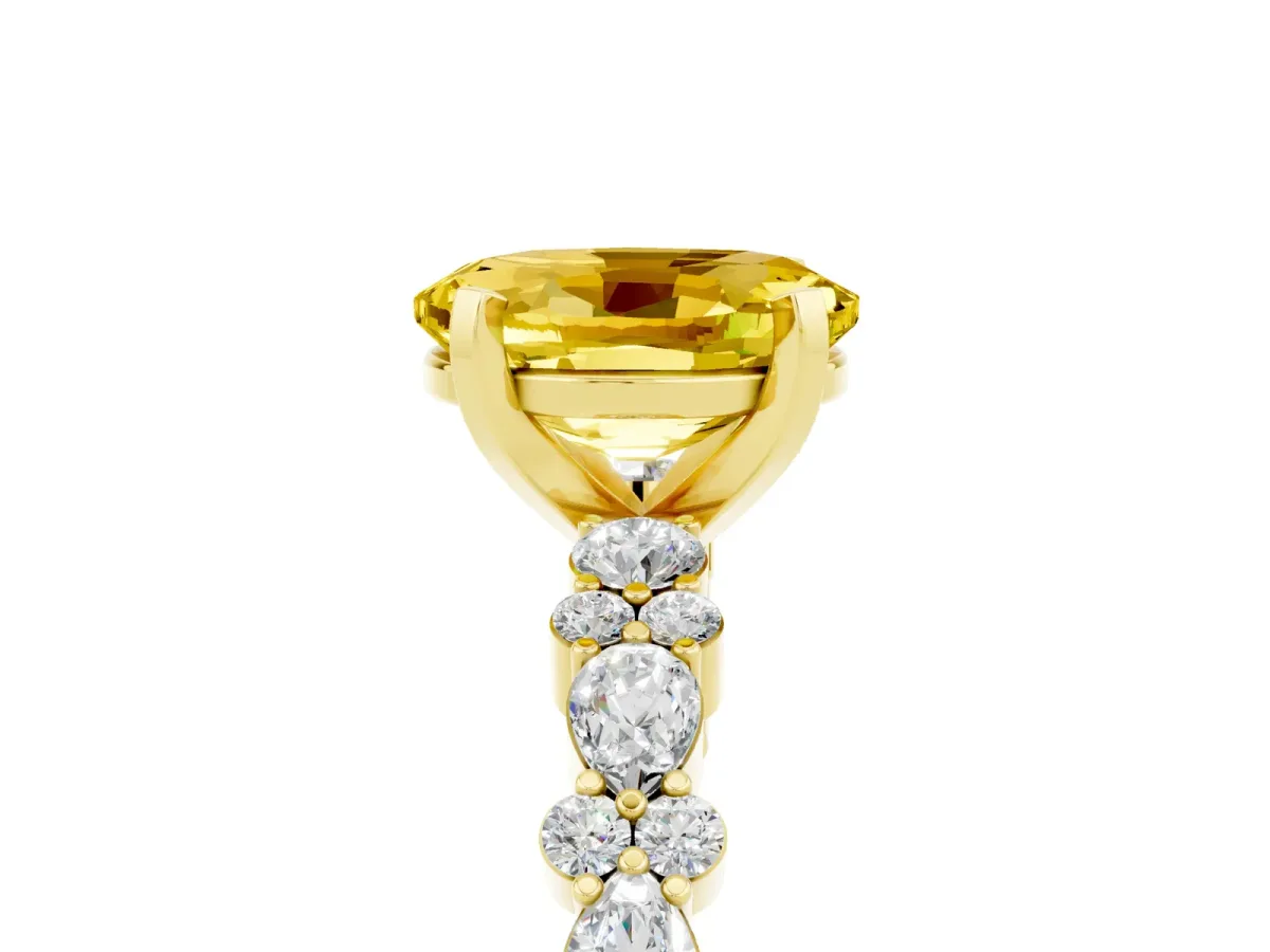 Oval Cut Yellow Sapphire Side Stone Solitaire Ring with Round and Four-Prong Setting Yellow gold