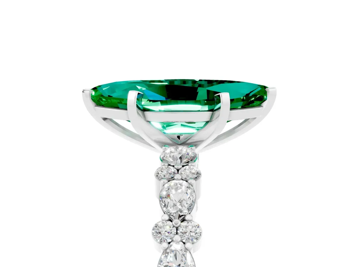 Marquise Cut Emerald Side Stone Solitaire Ring with Round and Four-Prong Setting White gold