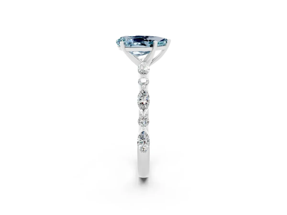 Pear Cut Aquamarine Ring with Marquise and Round Side Stones and Four-Prong Setting Silver