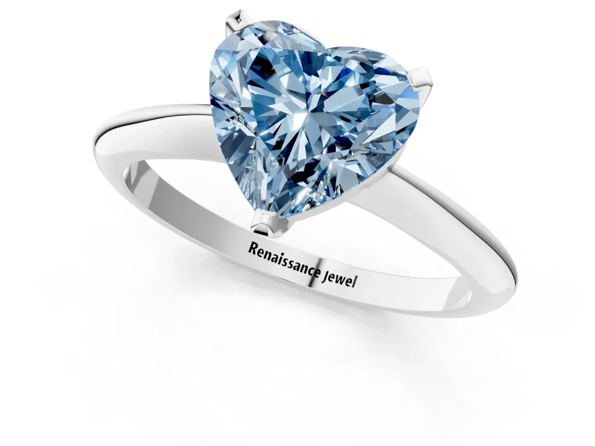 Fancy Blue Heart Cut Diamond Solitaire Engagement Ring with Classic Band and Four-Prong Setting Silver