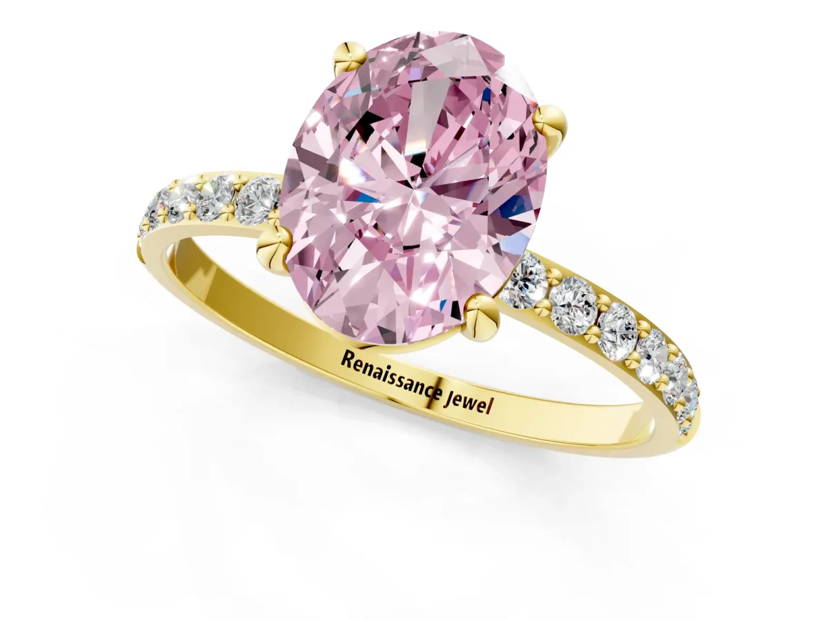 Fancy Pink Oval Cut Diamond Solitaire Ring with Round Pavé Band and Prong Setting Yellow gold