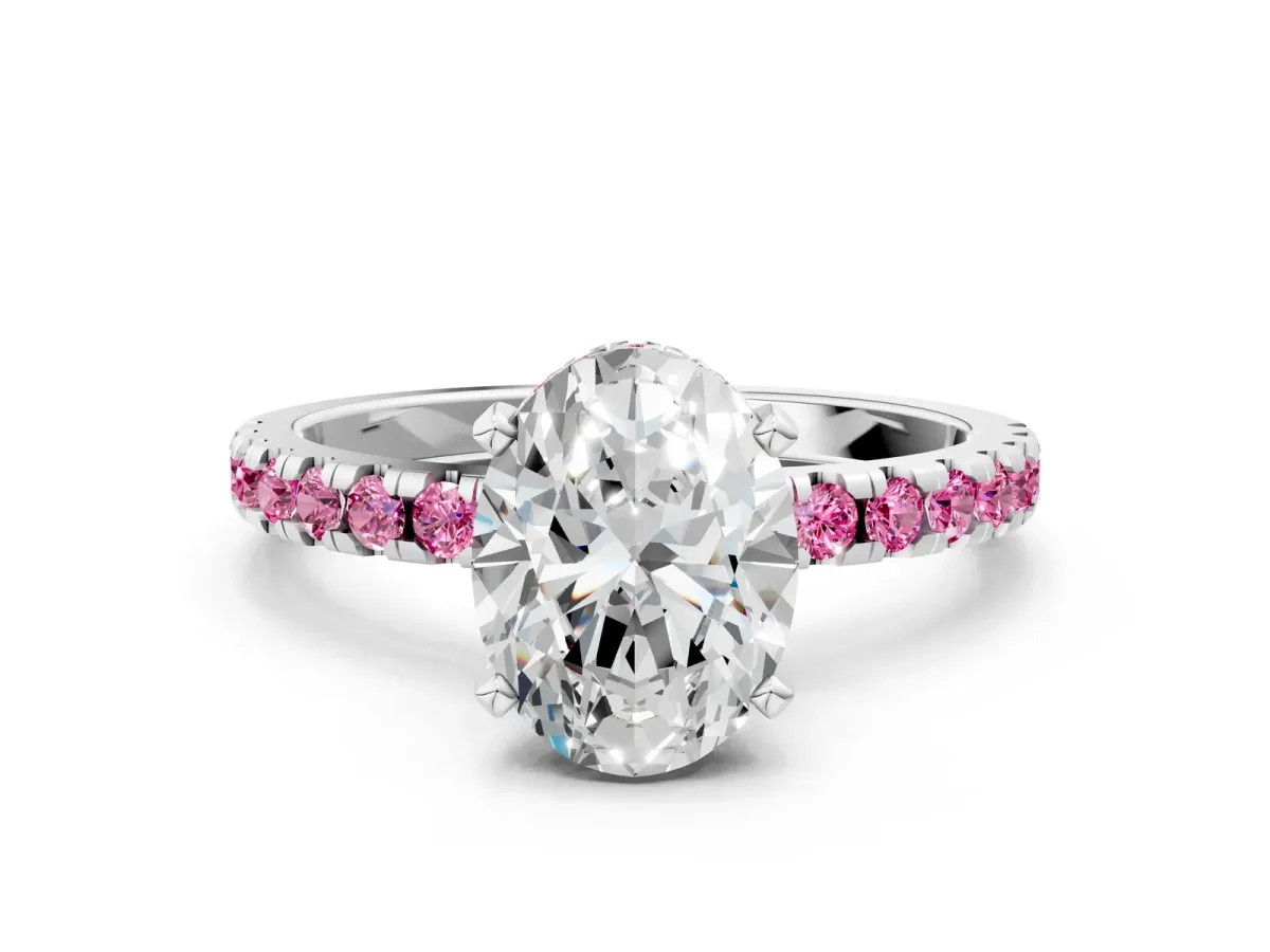 Oval Cut Diamond Solitaire Ring with Round Pink Sapphire Pavé Band and Four-Prong Setting Silver