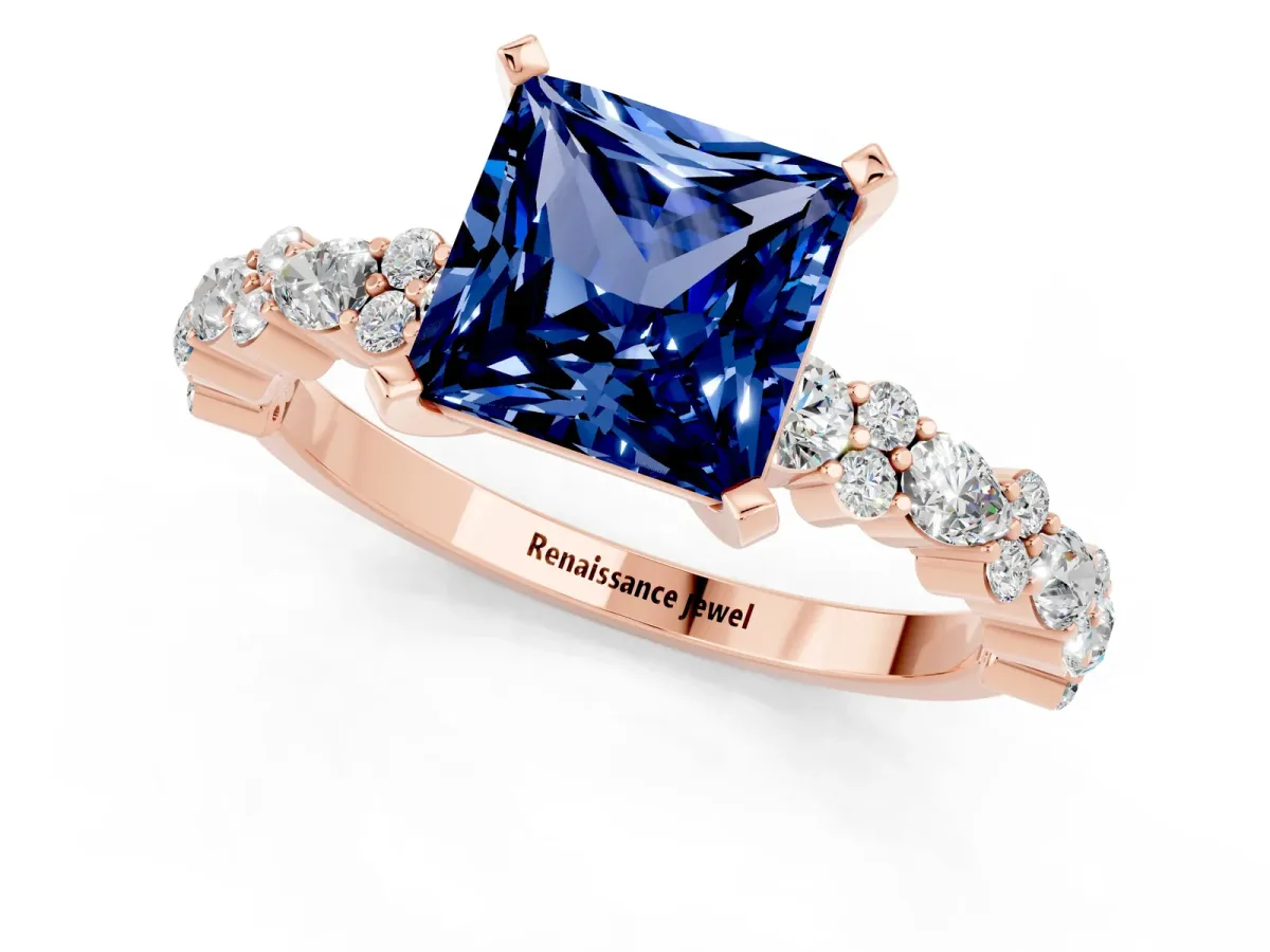 Princess Cut Blue Sapphire Side Stone Solitaire Ring with Round and Four-Prong Setting Rose gold