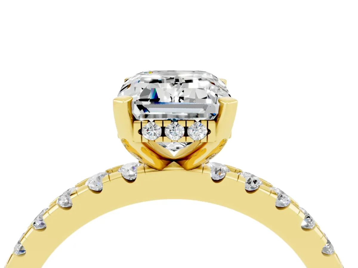 Emerald Cut Moissanite Solitaire Ring with Round Pavé Band and Four-Prong Setting Yellow gold