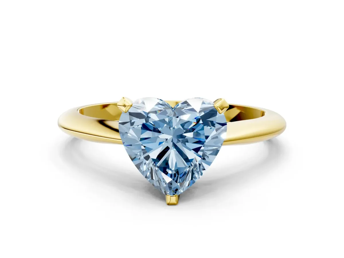 Fancy Blue Heart Cut Diamond Solitaire Engagement Ring with Classic Band and Four-Prong Setting Yellow gold