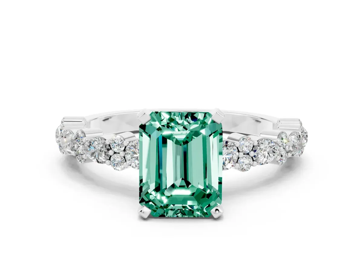 Emerald Cut Green Sapphire Side Stone Solitaire Ring with Round and Four-Prong Setting White gold
