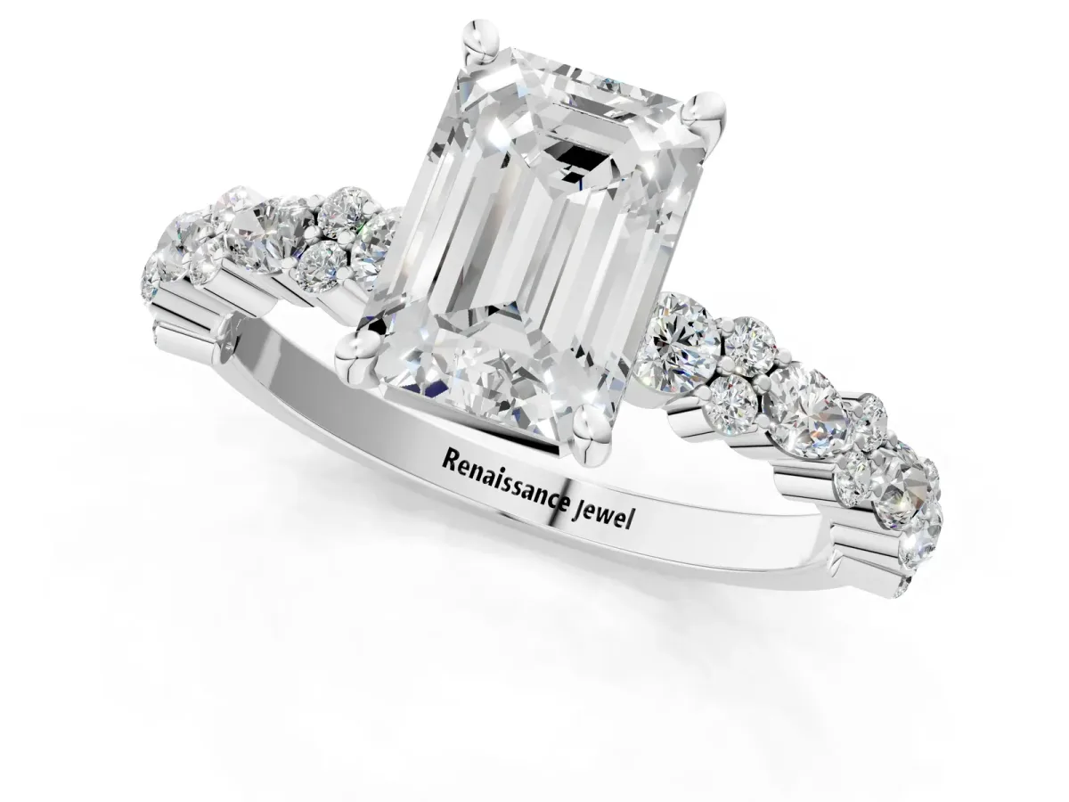 Emerald Cut Diamond Side Stone Solitaire Ring with Round and Four-Prong Setting White gold