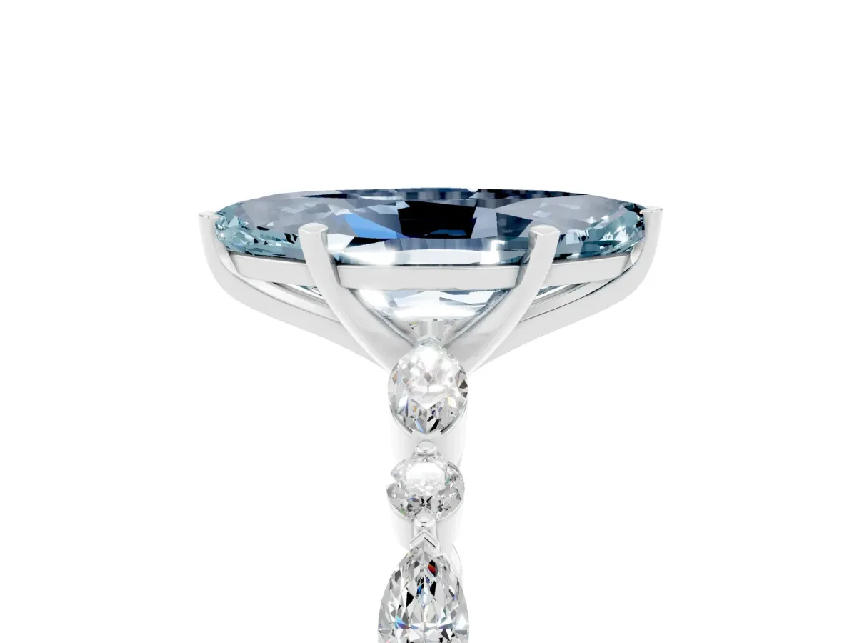 Marquise Cut Aquamarine Ring with Marquise and Round Side Stones and Four-Prong Setting Platinum