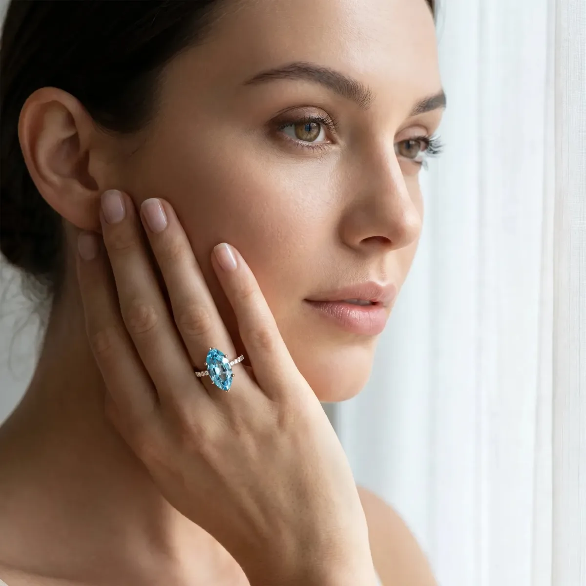 Marquise Cut Blue Topaz Solitaire Ring with Round Pavé Band and Four-Prong Setting Rose gold