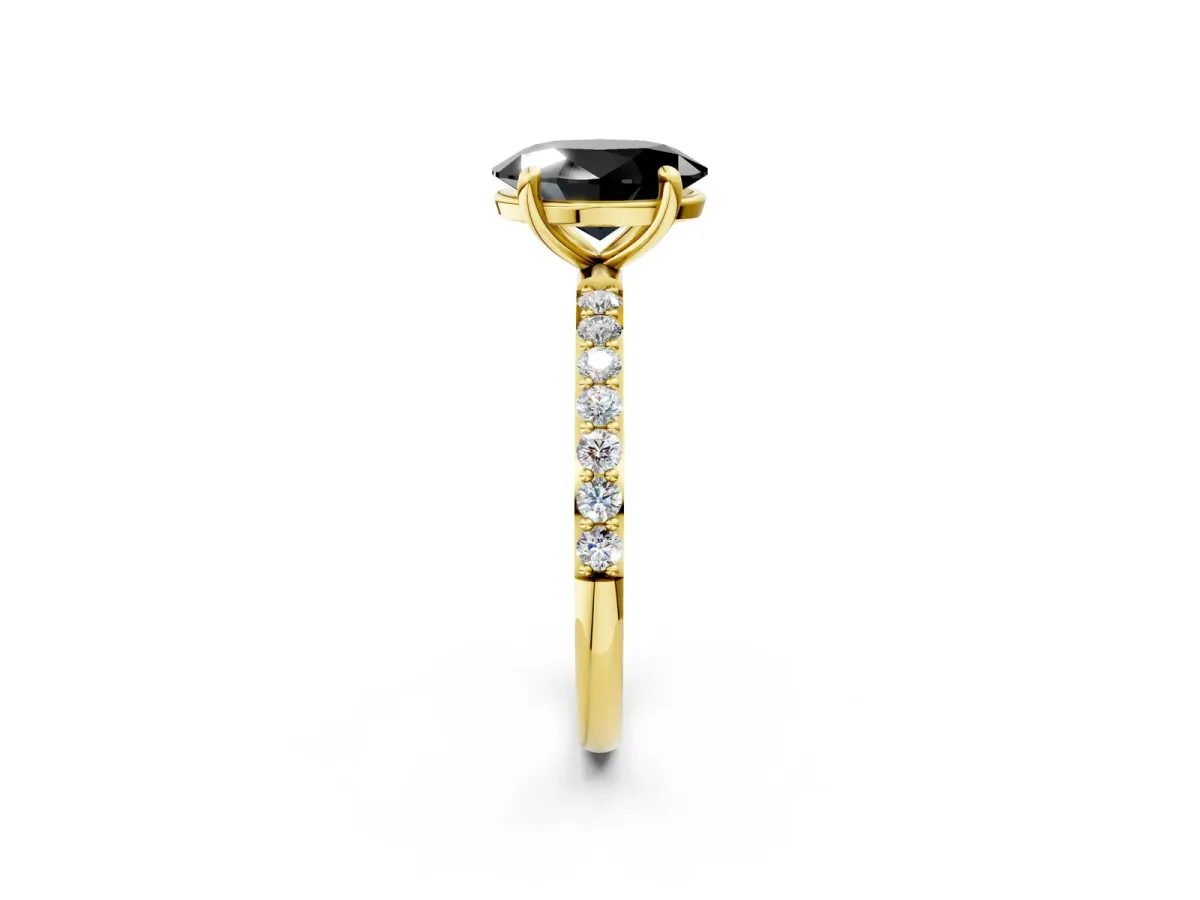 Fancy Black Oval Cut Diamond Solitaire Ring with Round Pavé Band and Prong Setting Yellow gold