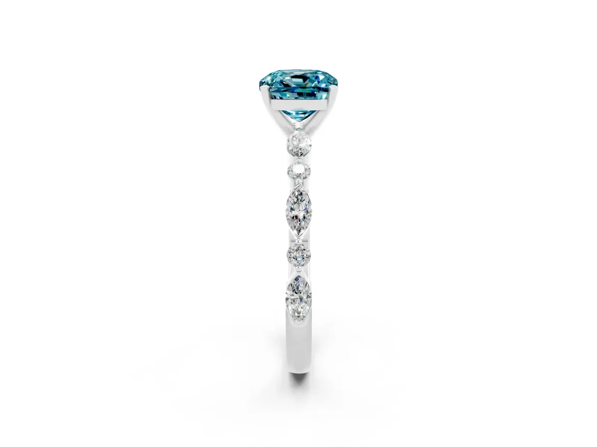 Cushion Cut Blue Topaz Ring with Marquise and Round Side Stones and Four-Prong Setting Silver