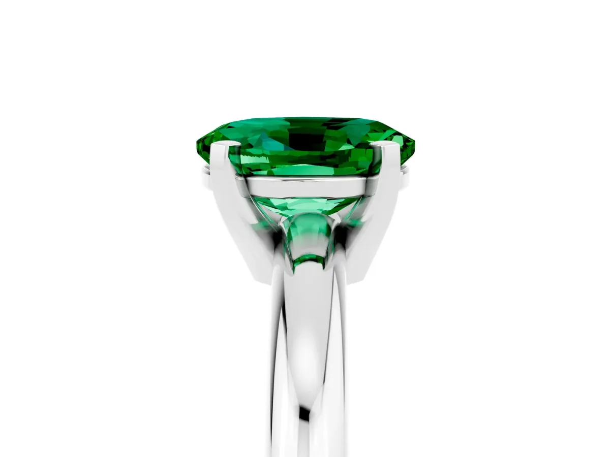 Oval Cut Emerald Solitaire Engagement Ring with Round Band and Four-Prong Setting Platinum