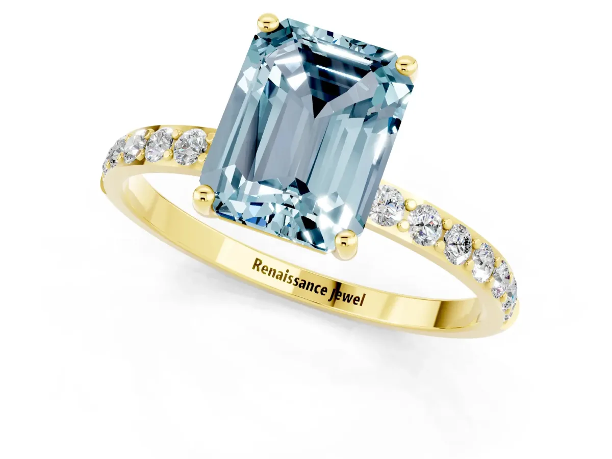 Emerald Cut Aquamarine Solitaire Ring with Round Pavé Band and Prong Setting Yellow gold