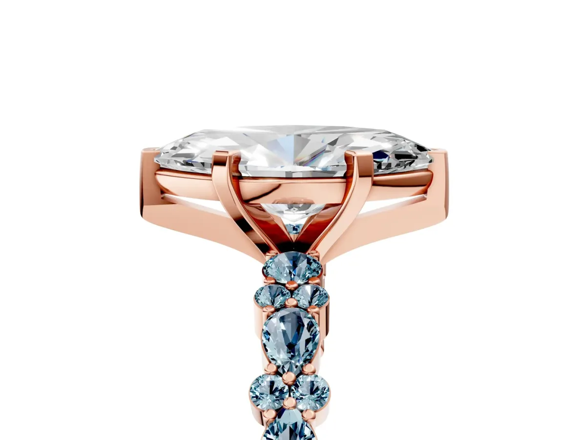 Marquise Cut Diamond Side Stone Solitaire Ring with Round Aquamarine and Four-Prong Setting Rose gold