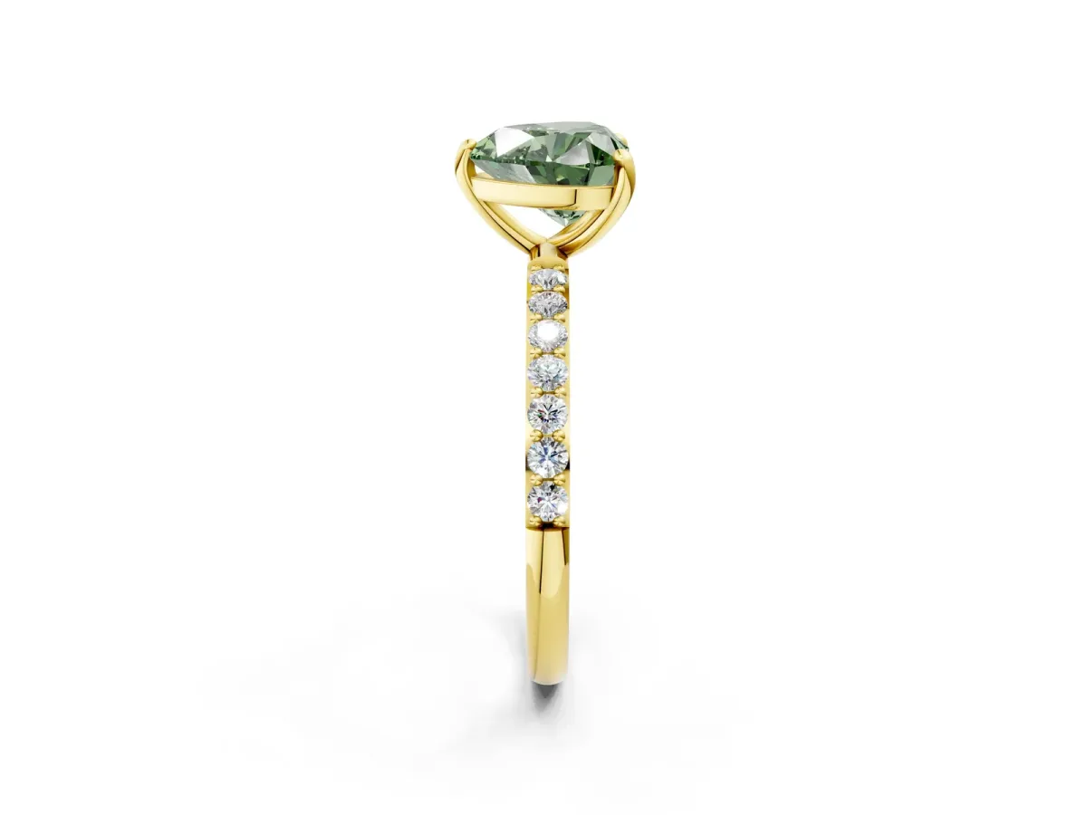 Fancy Green Heart Cut Diamond Solitaire Ring with Round Pavé Band and Prong Setting Yellow gold