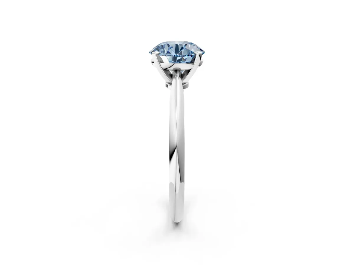 Fancy Blue Round Cut Diamond Solitaire Engagement Ring with Classic Band and Four-Prong Setting White gold