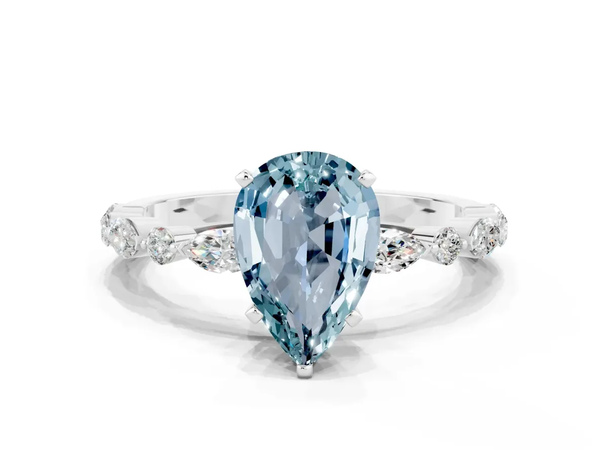 Pear Cut Aquamarine Ring with Marquise and Round Side Stones and Four-Prong Setting Silver
