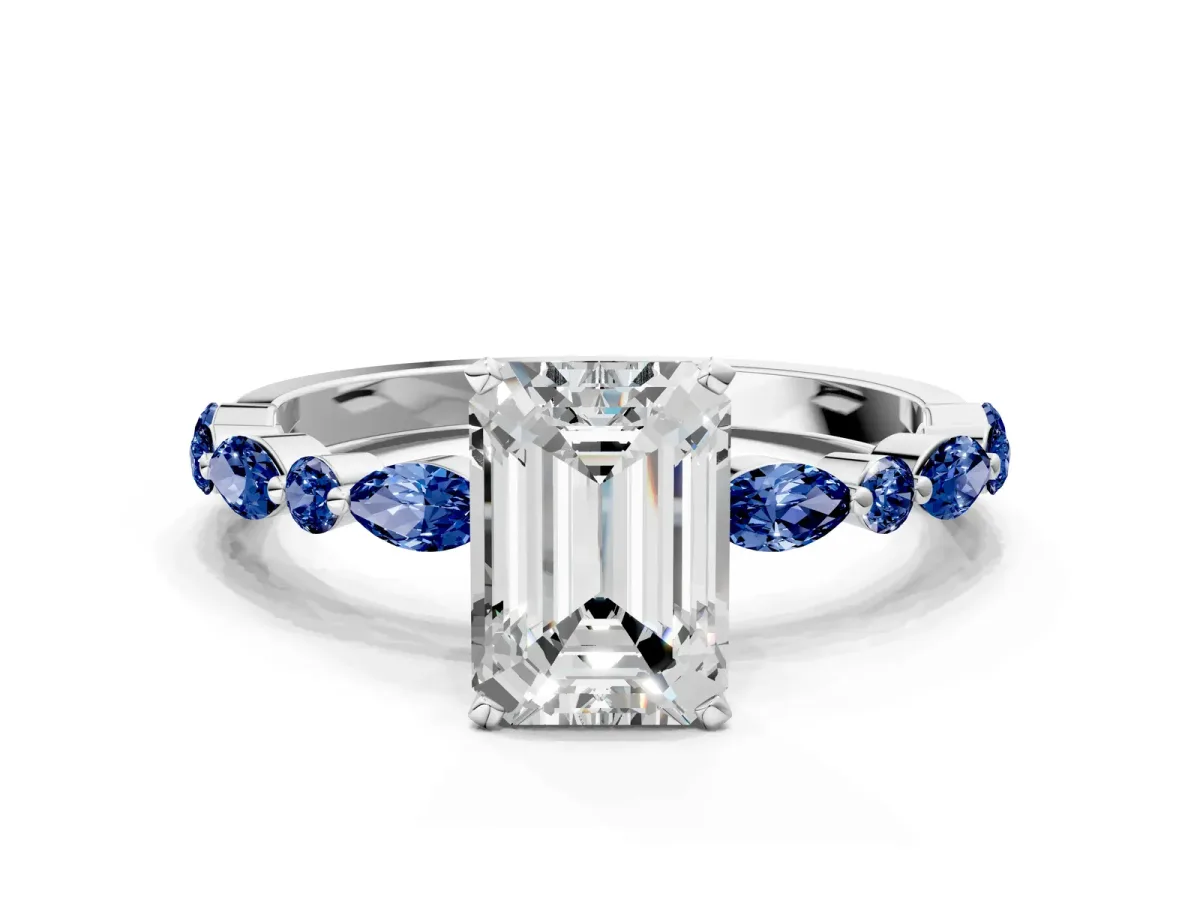 Emerald Cut Diamond Ring with Marquise and Round Blue Sapphire Side Stones and Four-Prong Setting Silver
